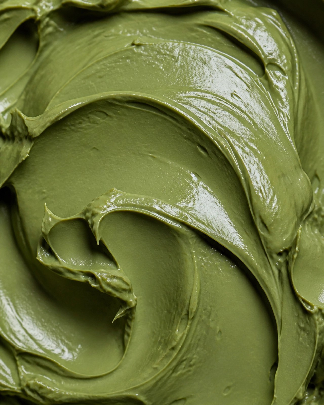 Close up of creamy green clay texture