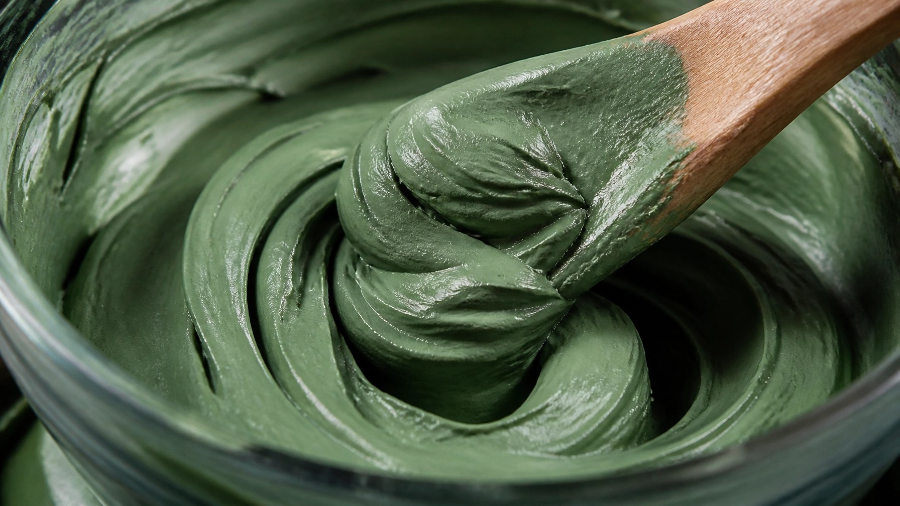 Mixing French green clay in a bowl