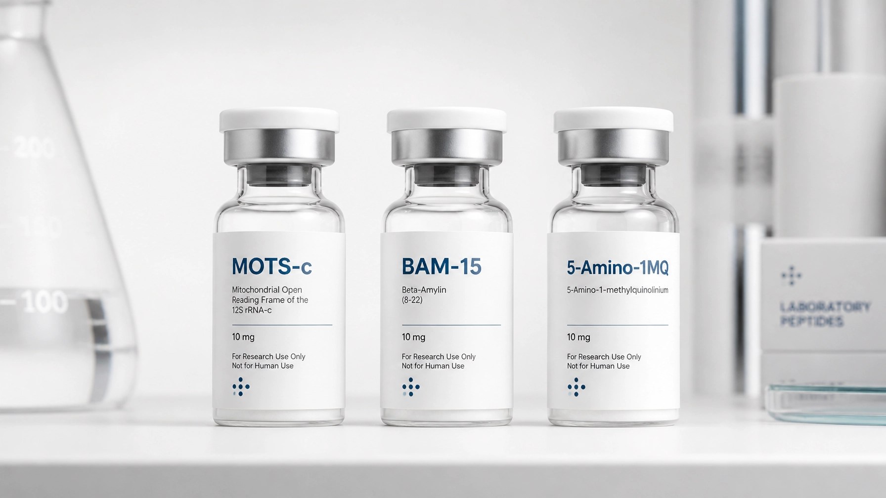 Group of minimalist medical vials including MOTS-c and BAM-15