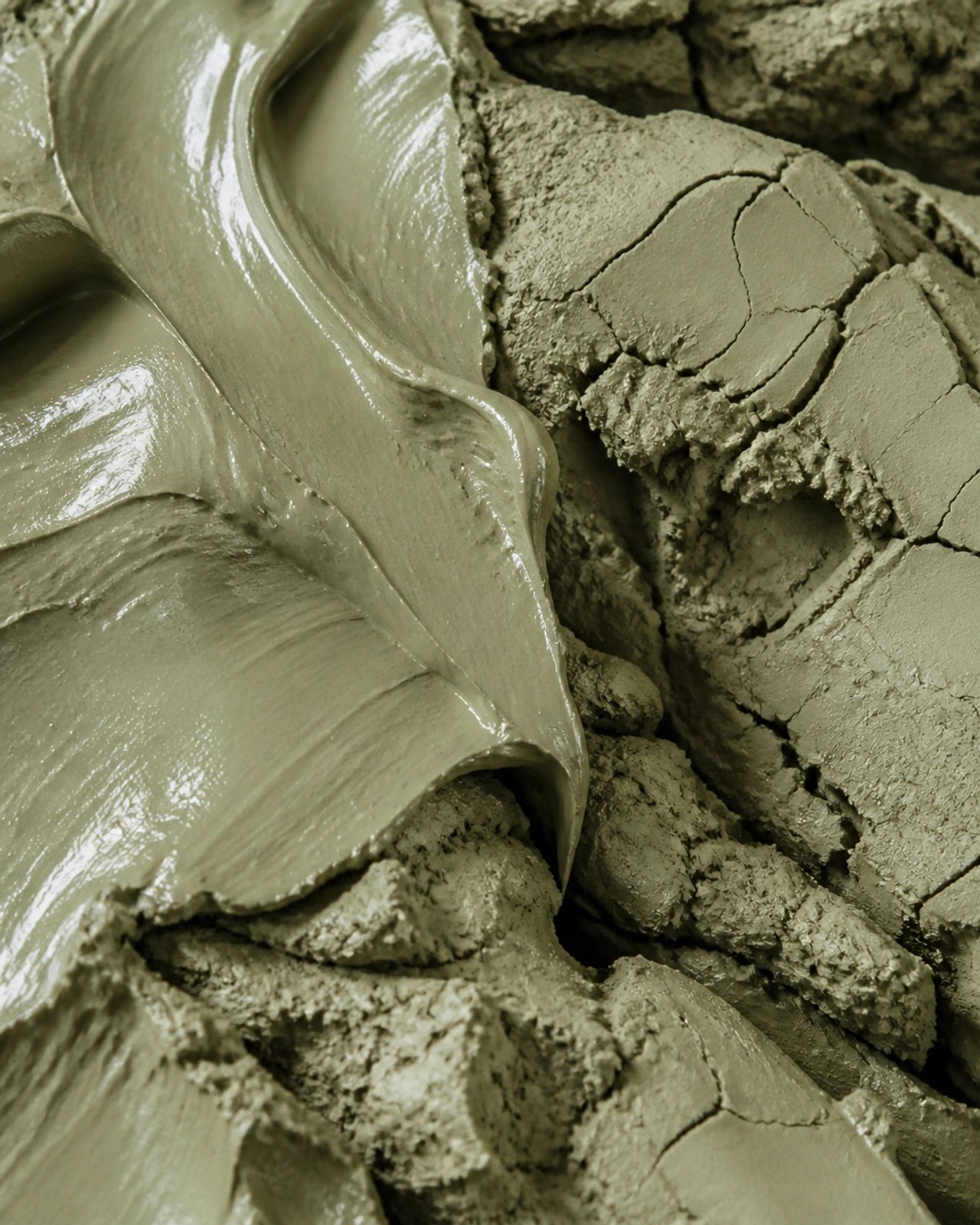 Macro shot of mineral-rich green clay texture