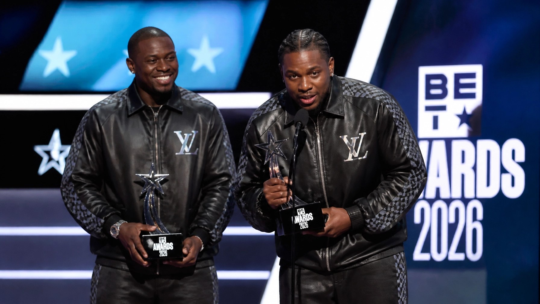 Clipse holding their trophies on the BET Awards stage
