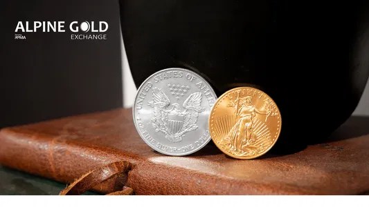 Real-world gold and silver coins with an old leather-bound ledger representing documented provenance