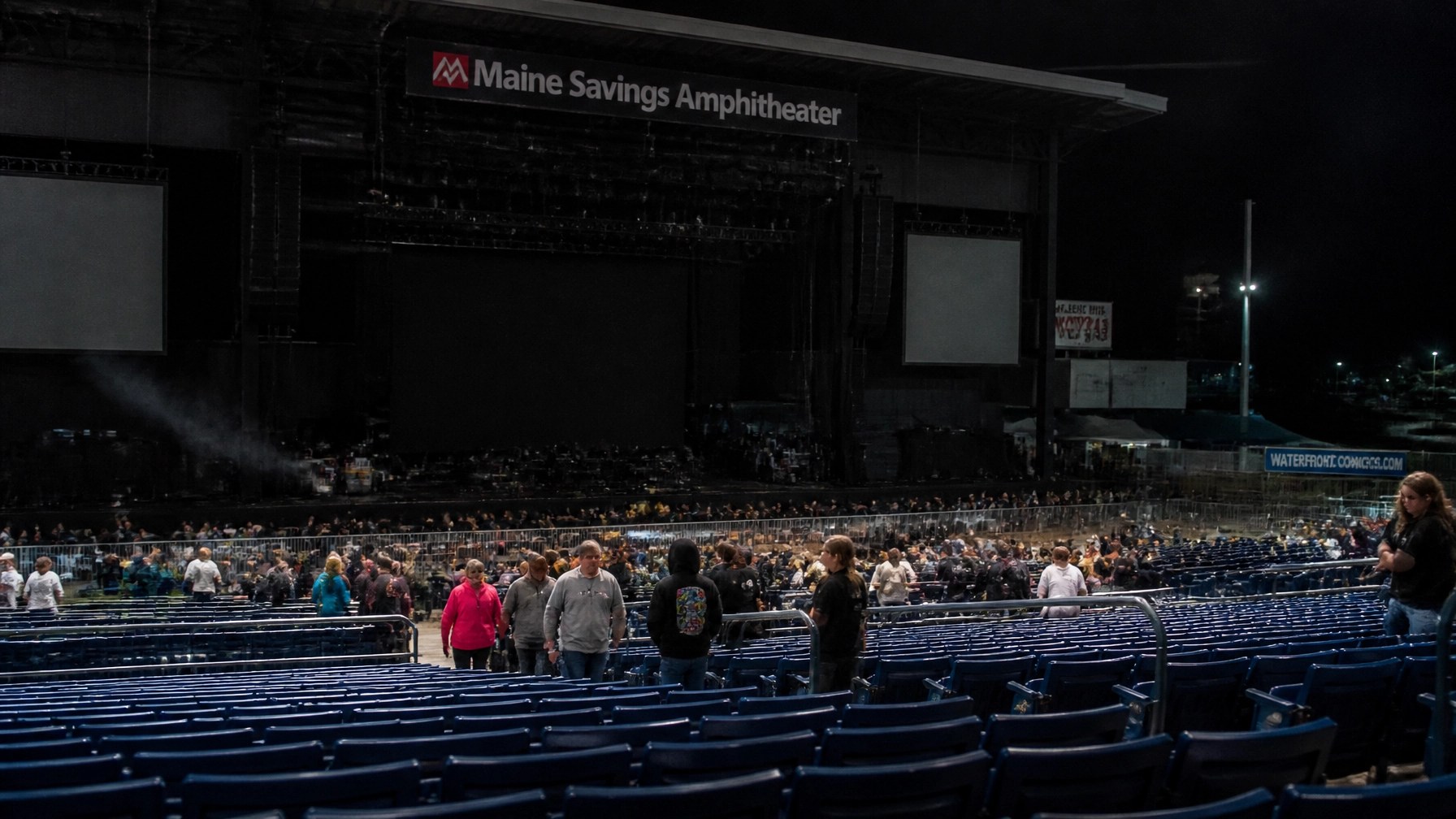 Maine Savings Amphitheater at night with a dark stage