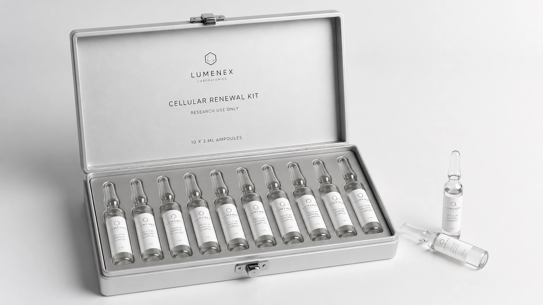 Clean, clinical shot of a silver kit box with glass ampoules neatly arranged
