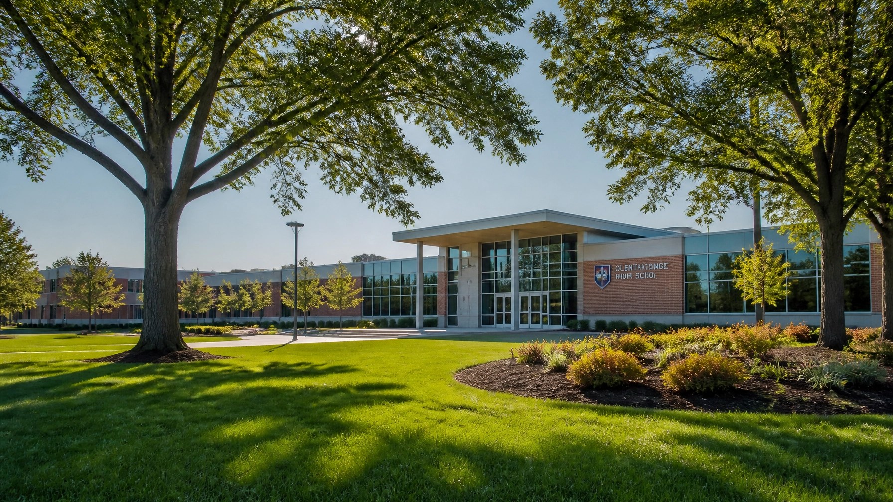 A professional photograph of a modern suburban school building in Ohio, representing a high-quality community environment.