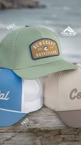 Professional display of Pacific Headwear styles with custom patches and embroidery