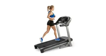 Female athlete completing a focused treadmill workout