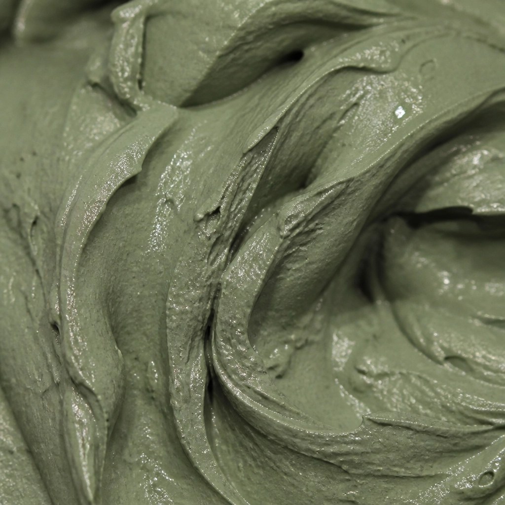 Macro shot of smooth French green clay texture