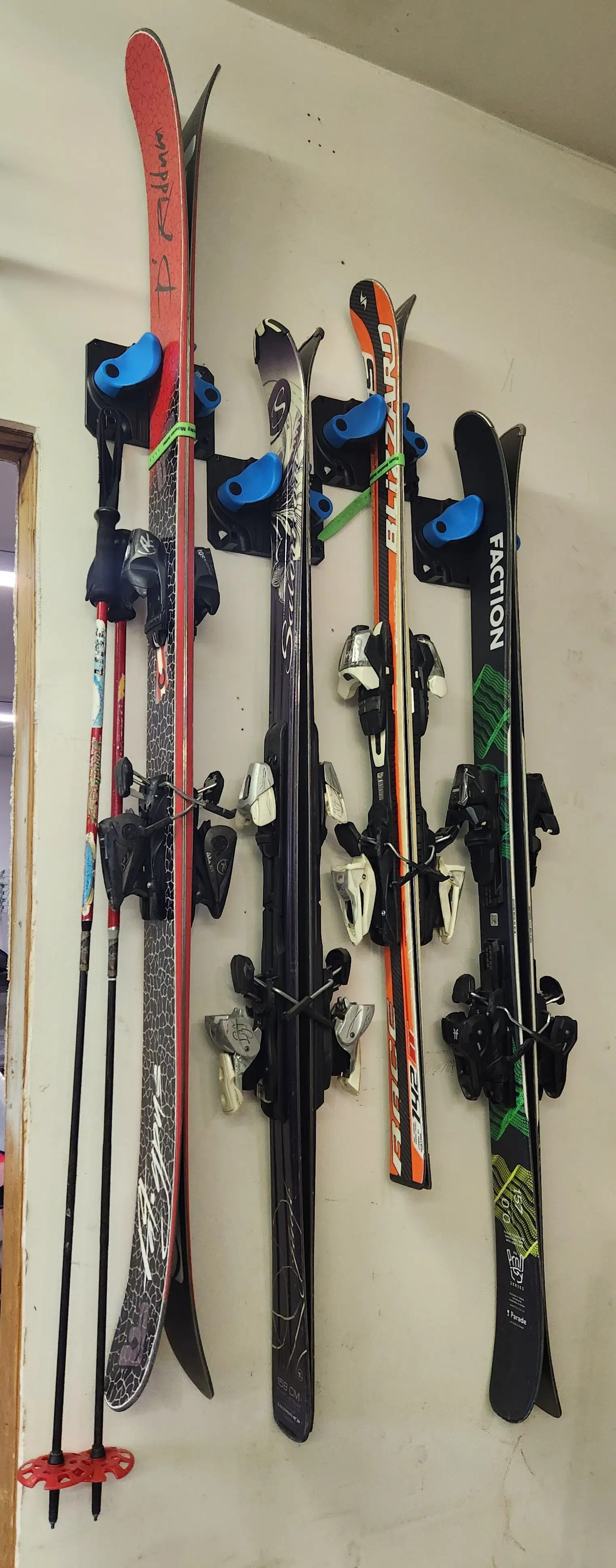 Real-life ski storage using wall-mounted ski racks