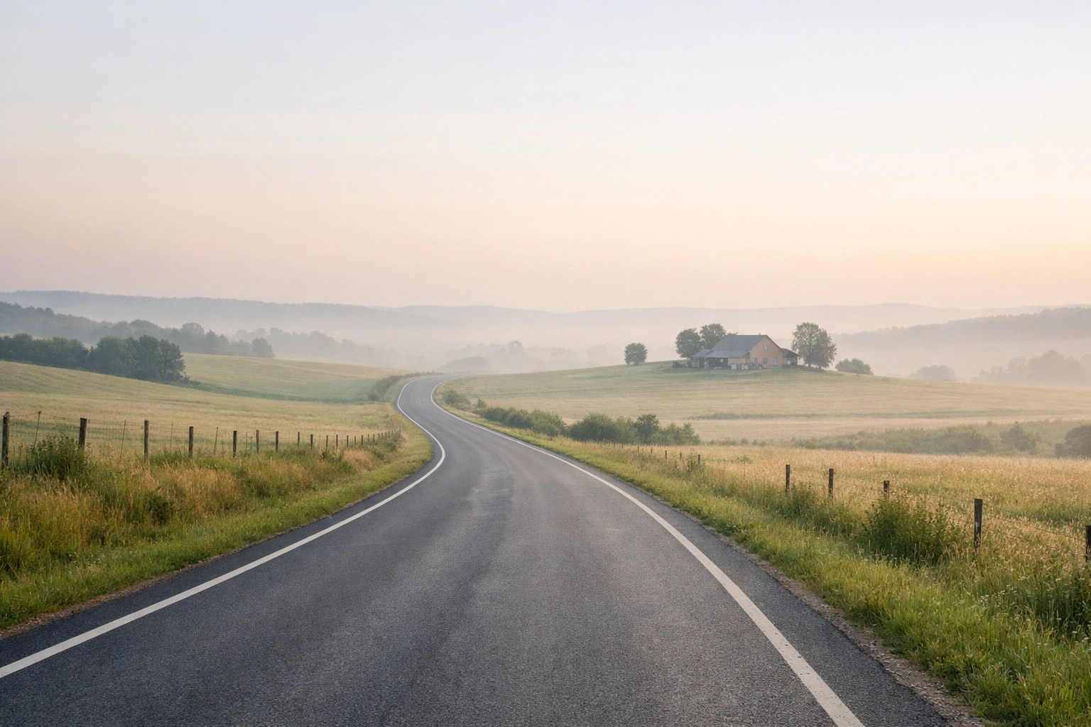 Winding rural road at dawn highlighting the challenge of the transportation desert in healthcare access.