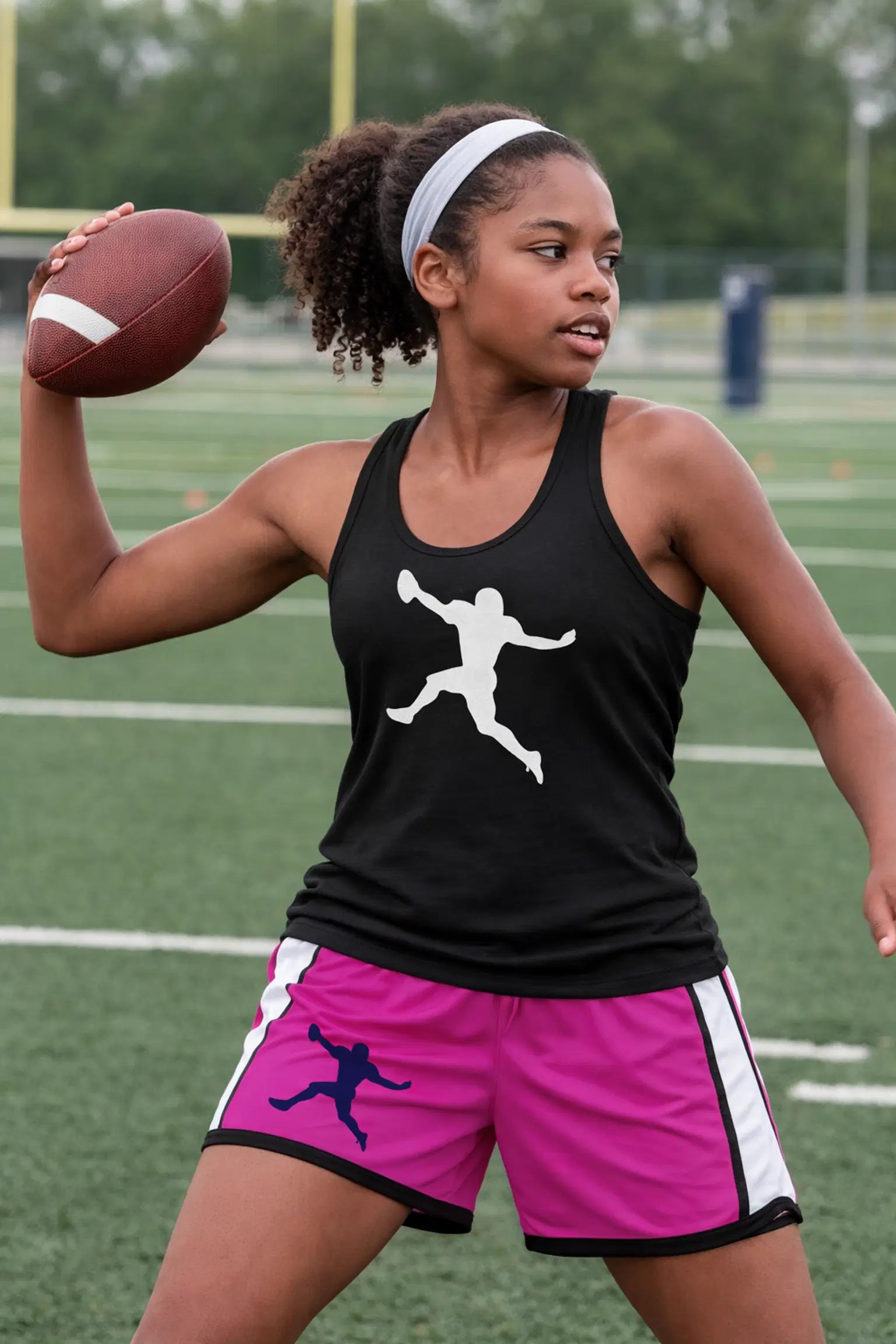 iDareU Academy girls flag football athlete throwing on an Atlanta field