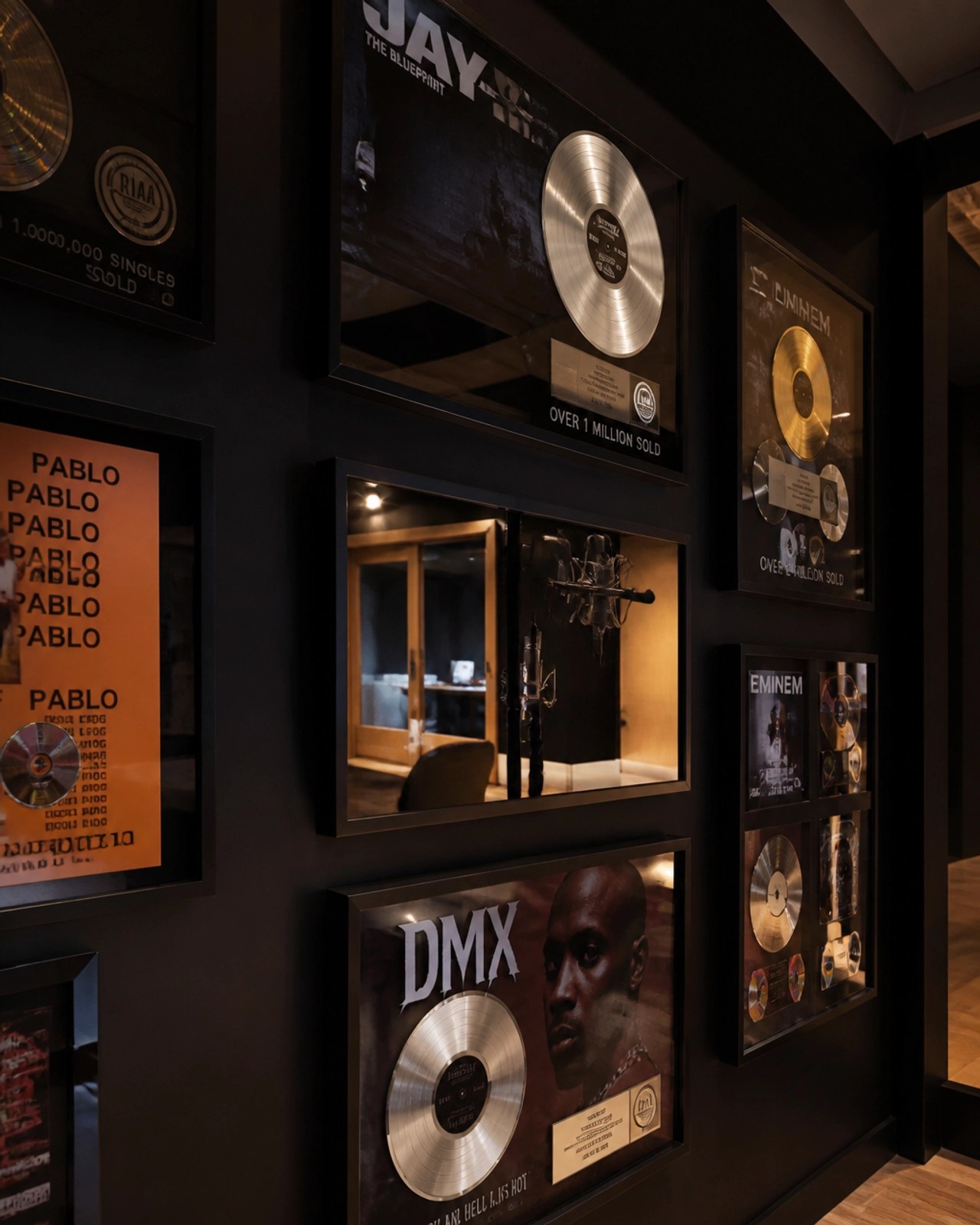 Music studio wall with gold and platinum records