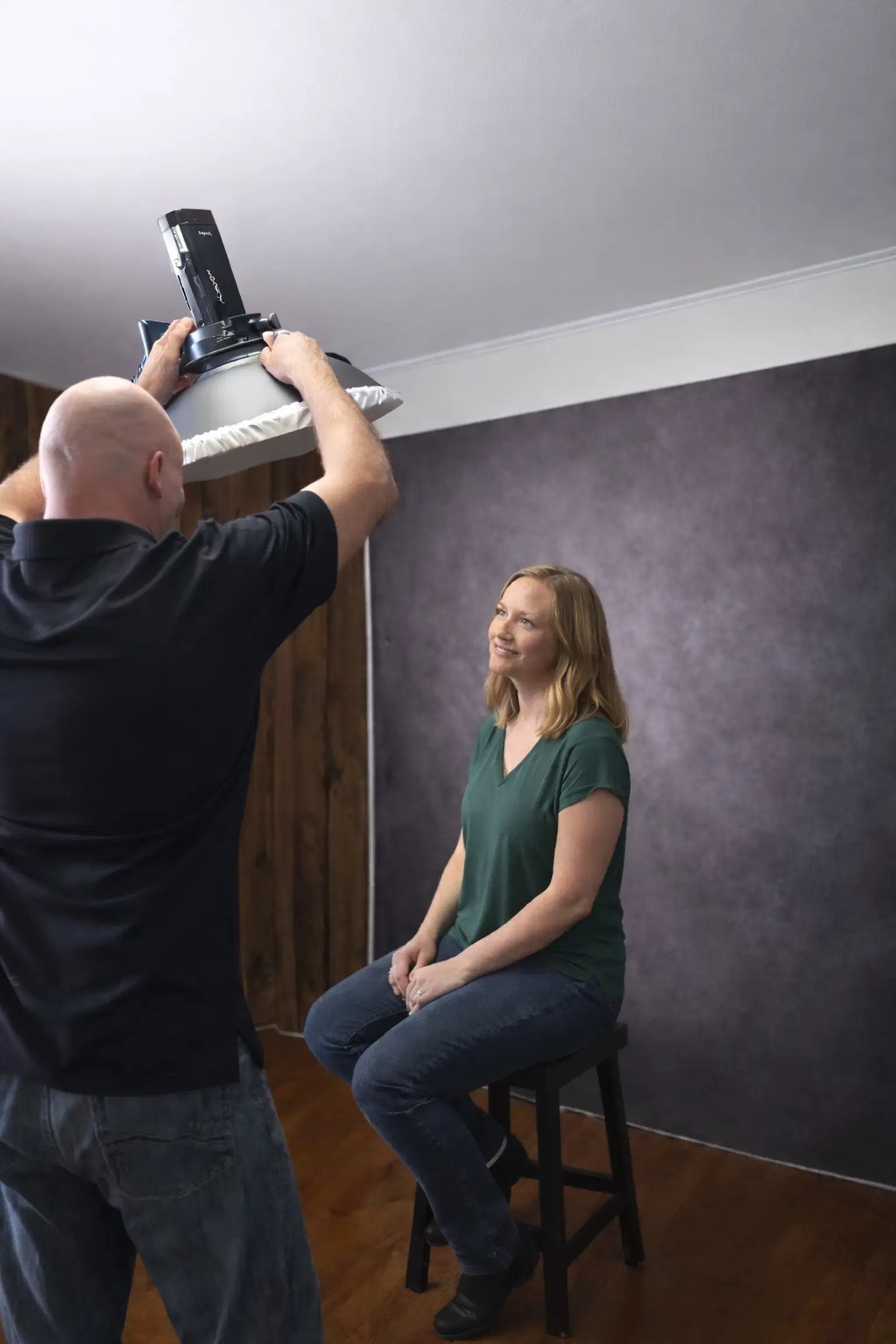 Mike having a bright idea and adjusting a softbox like the studio lighting whisperer he is