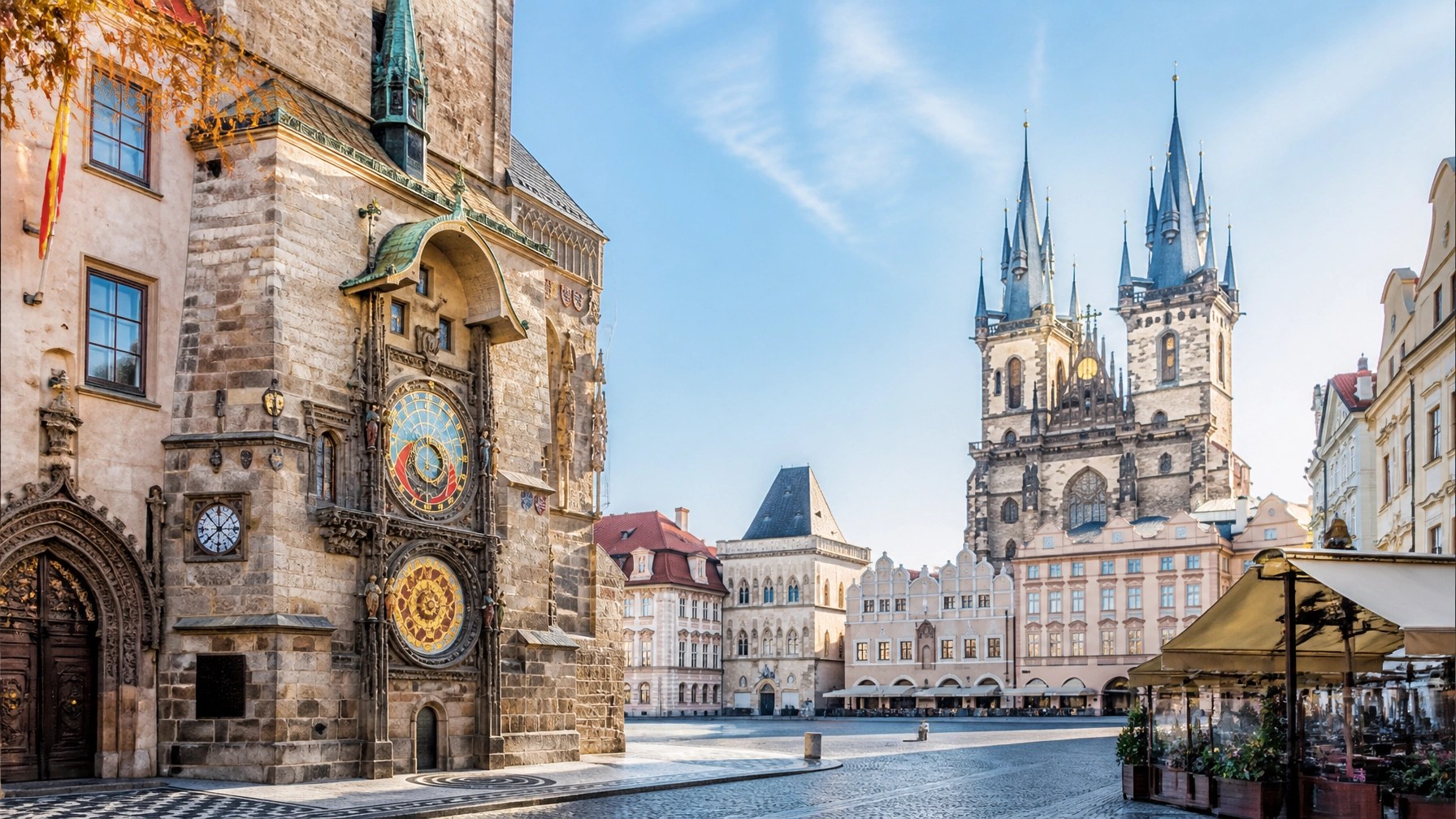 Prague Old Town glowing in crisp autumn daylight with medieval architecture