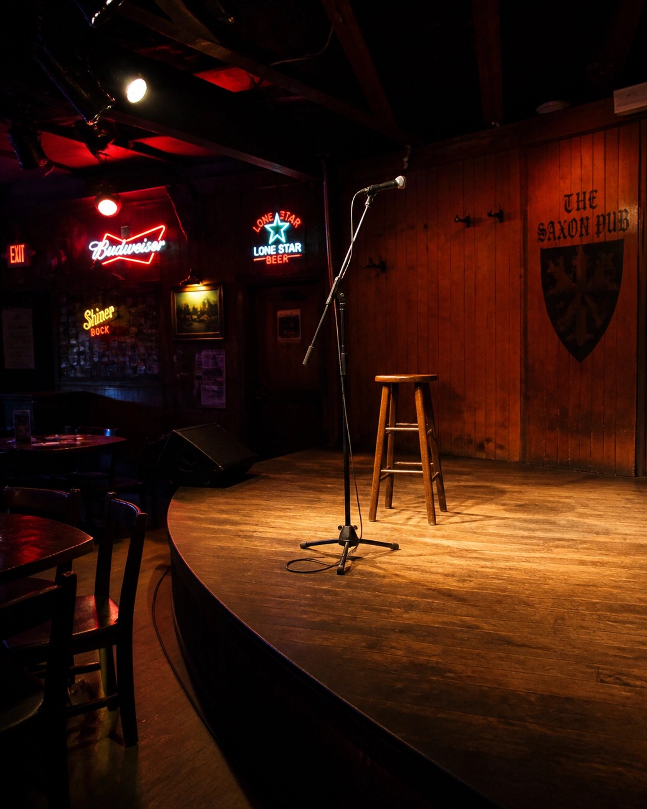 Interior of an intimate music venue stage similar to The Saxon Pub