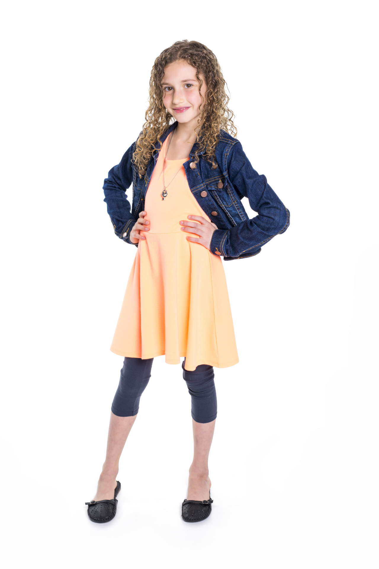 Full-length studio portrait of a young girl