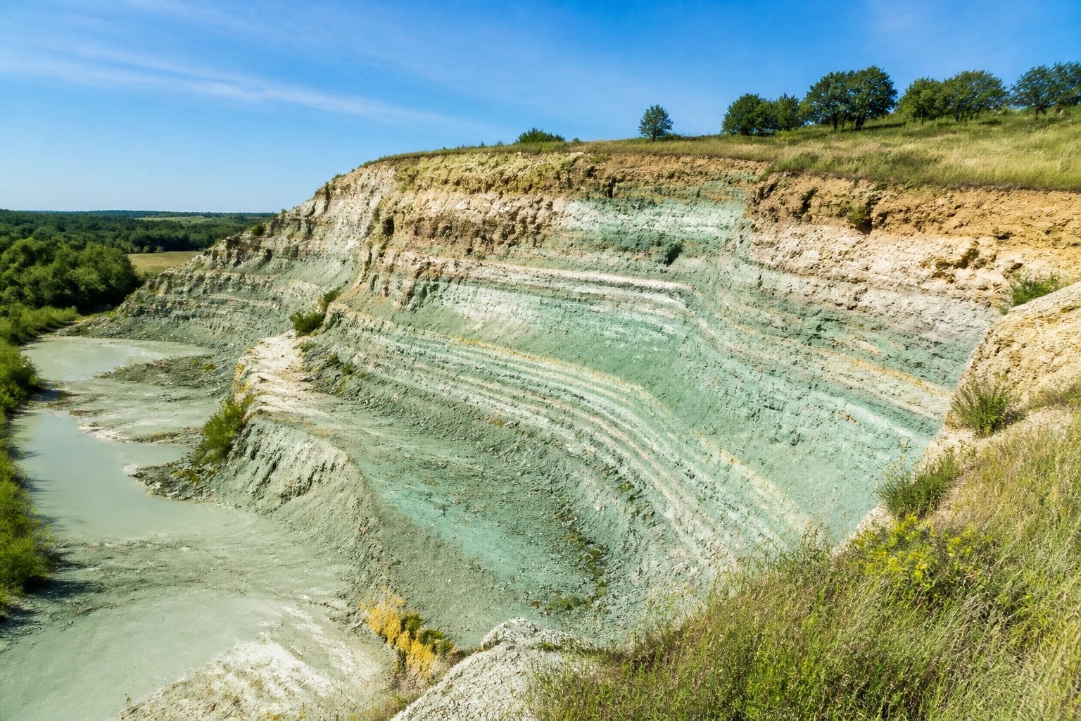 Natural French Green Illite Clay quarry showcasing the pure mineral source for deep tissue detox.