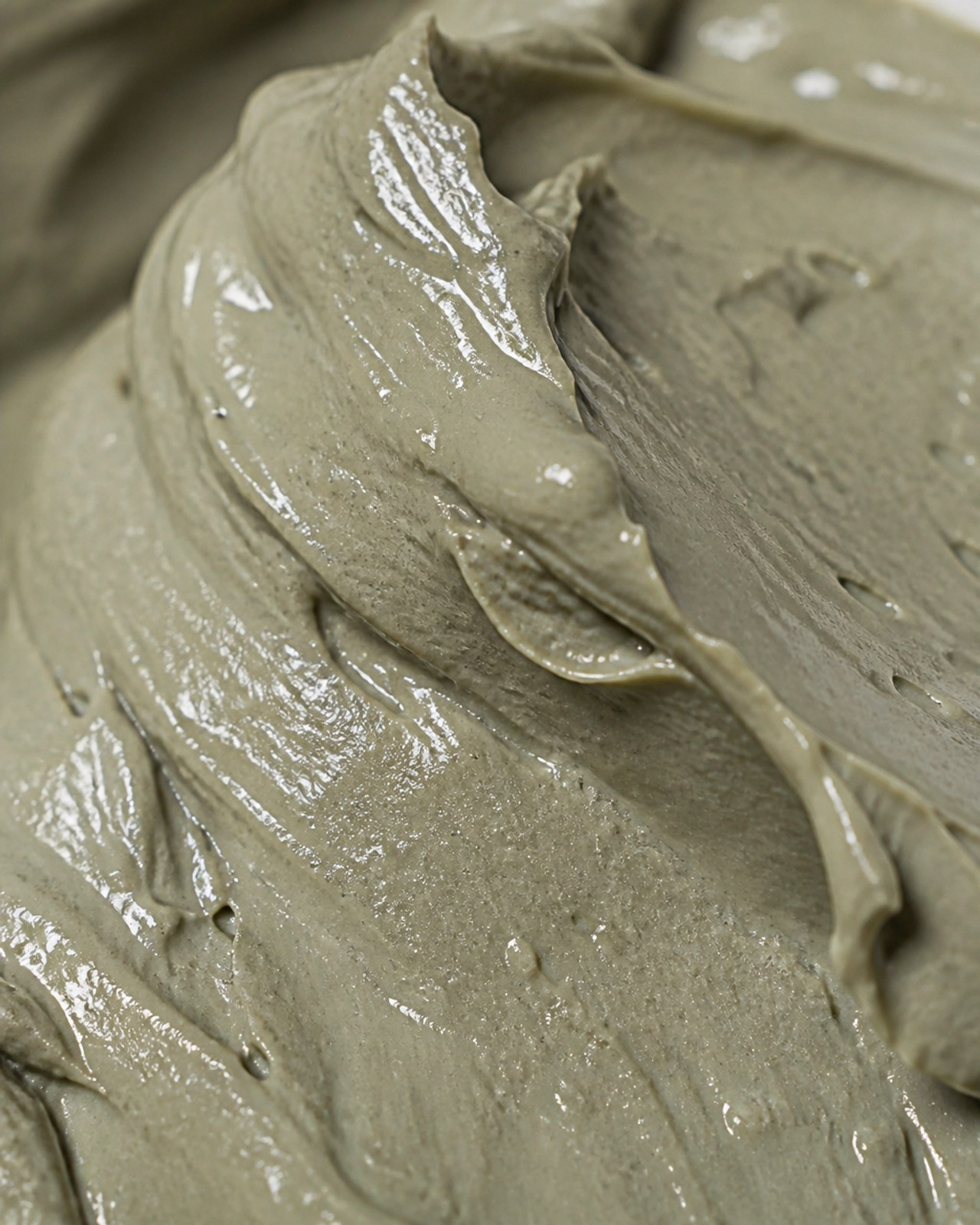 Close-up of rich, creamy French green clay texture