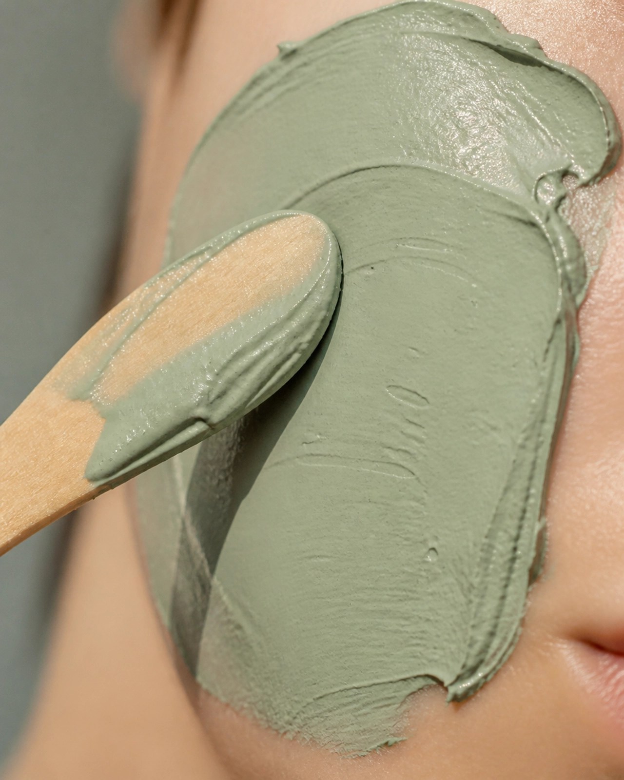 Luxury green clay texture on skin