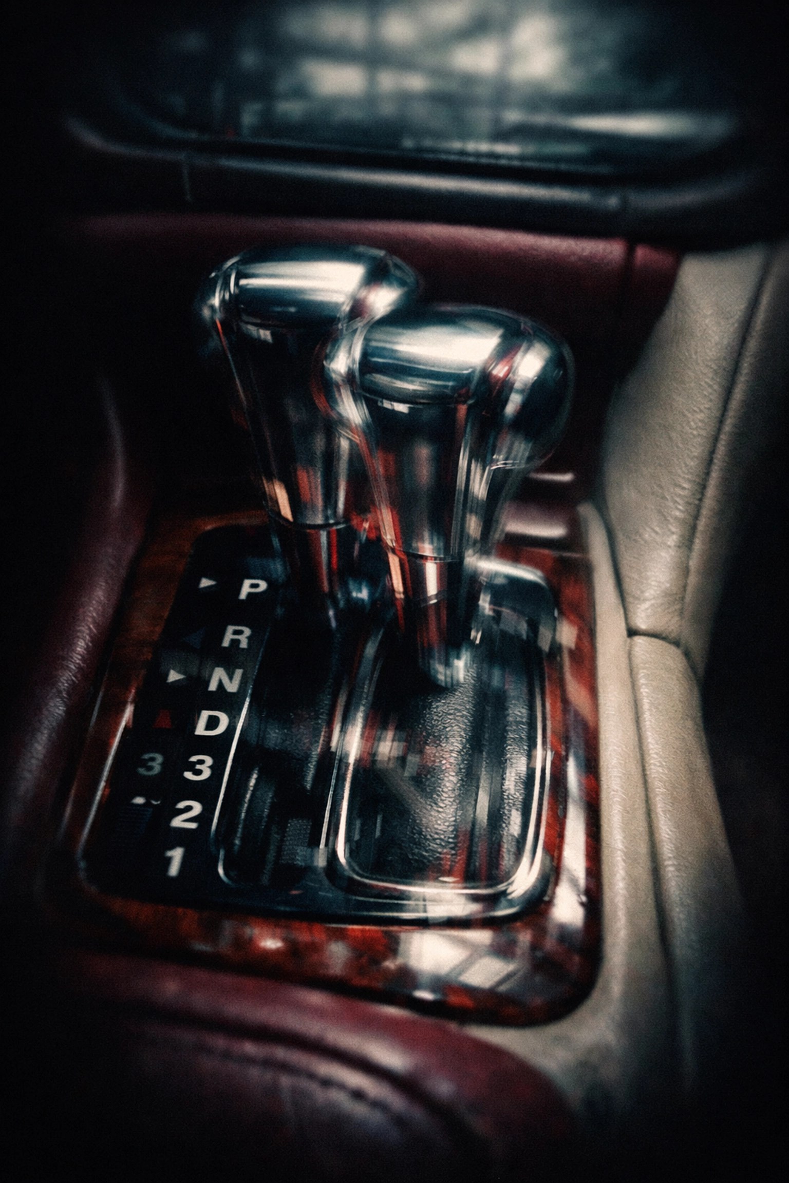AI photo glitch showing double gear shifters in 1999 Cadillac DeVille interior