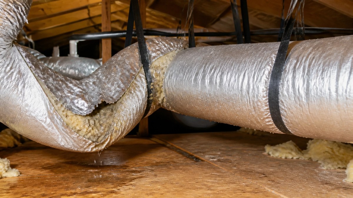Damaged and properly supported insulated ductwork in a Southwest Florida attic