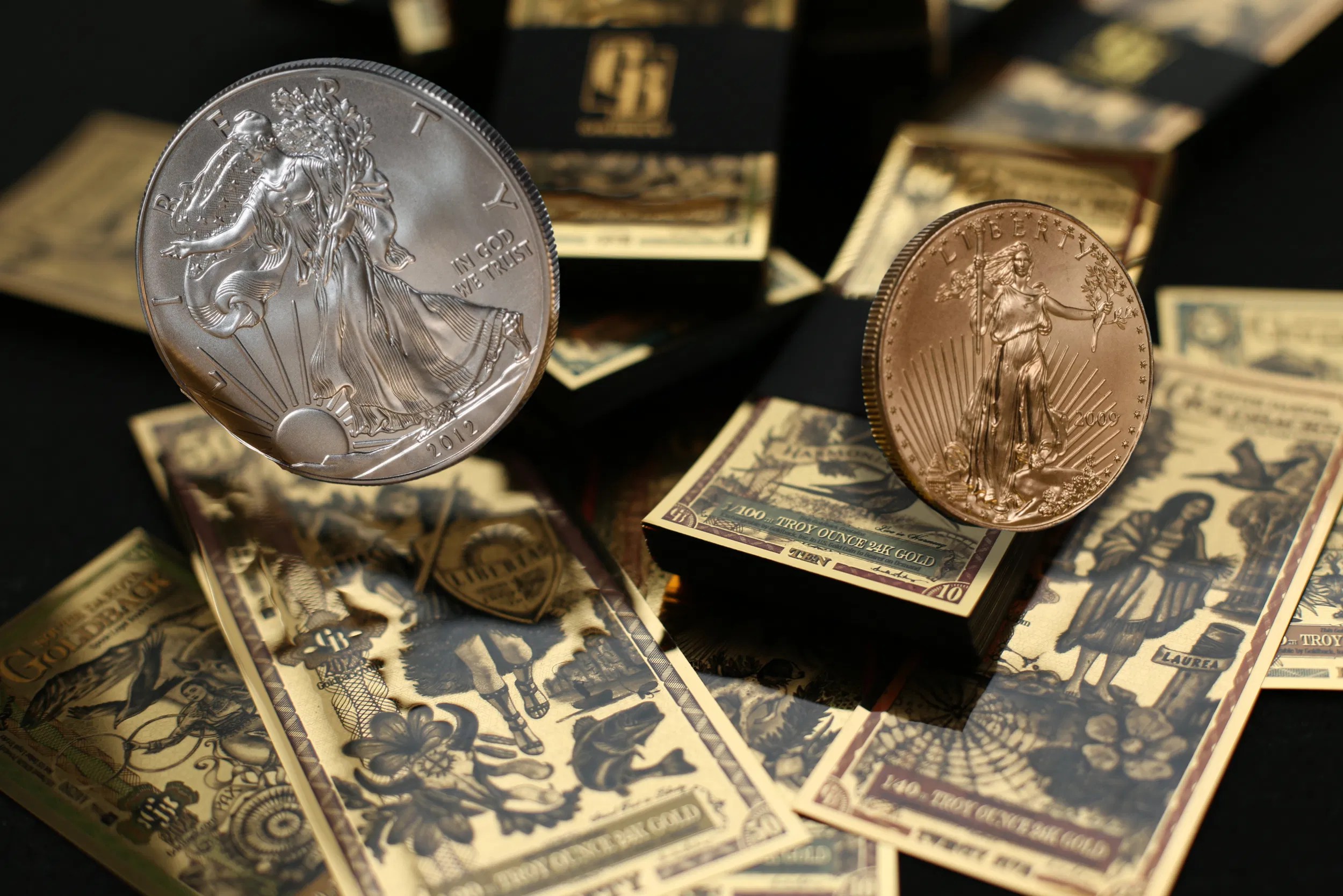 Silver and gold coins representing tangible, provable asset classes supported by MetallumX.