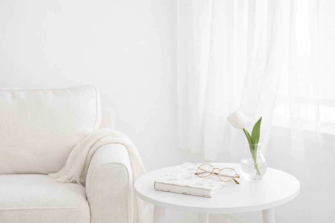 Peaceful room featuring a floral Christian planner on a table for organized, grace-filled living.