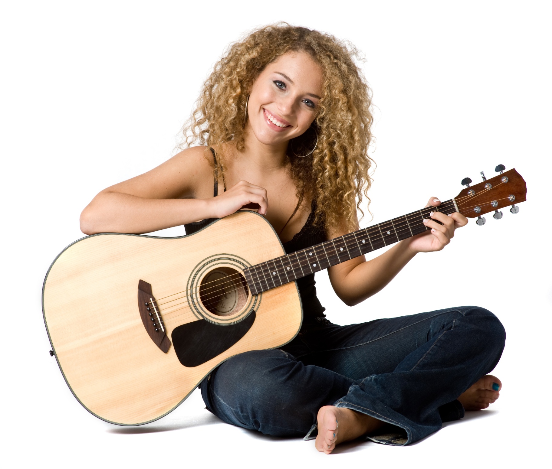 Young Woman with Guitar in Studio