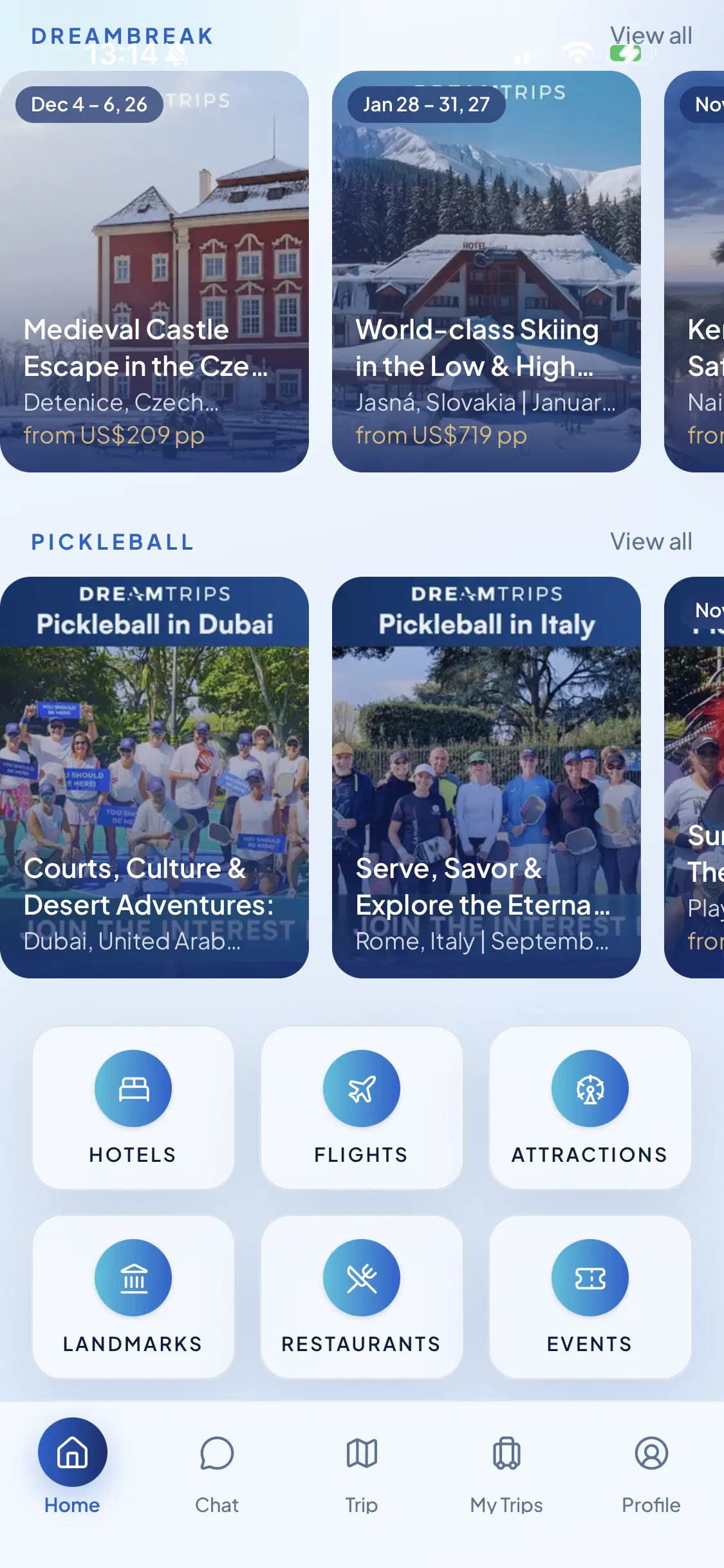 DreamTrips AI app screen showing Dream Breaks with dates and prices, plus booking tiles for hotels, flights, attractions and restaurants
