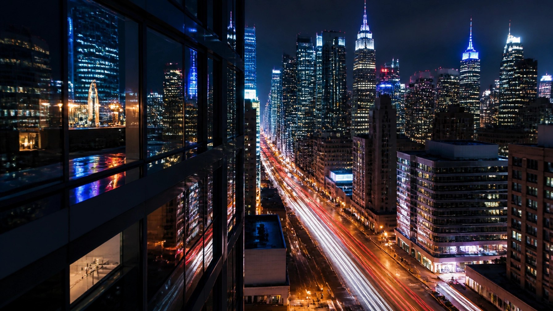 Manhattan skyline glowing at night with neon lights, luminous towers, and streaking traffic creating a cinematic city mood.