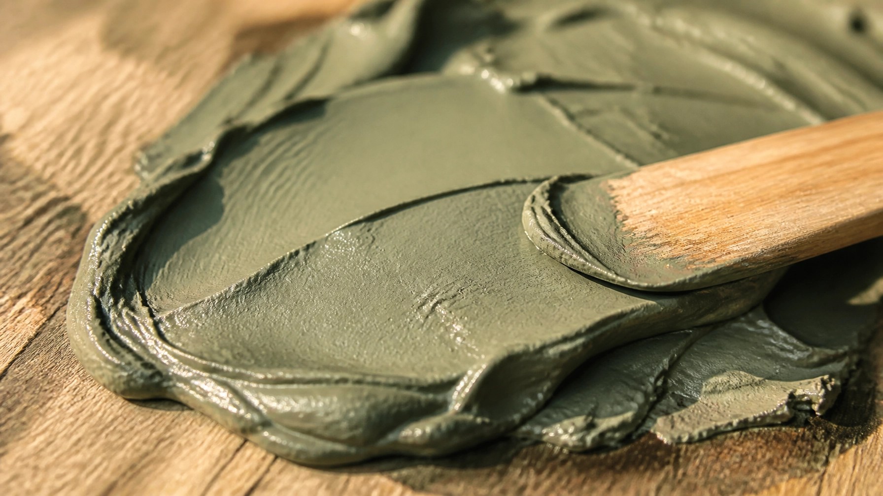Close up of smooth French green clay texture