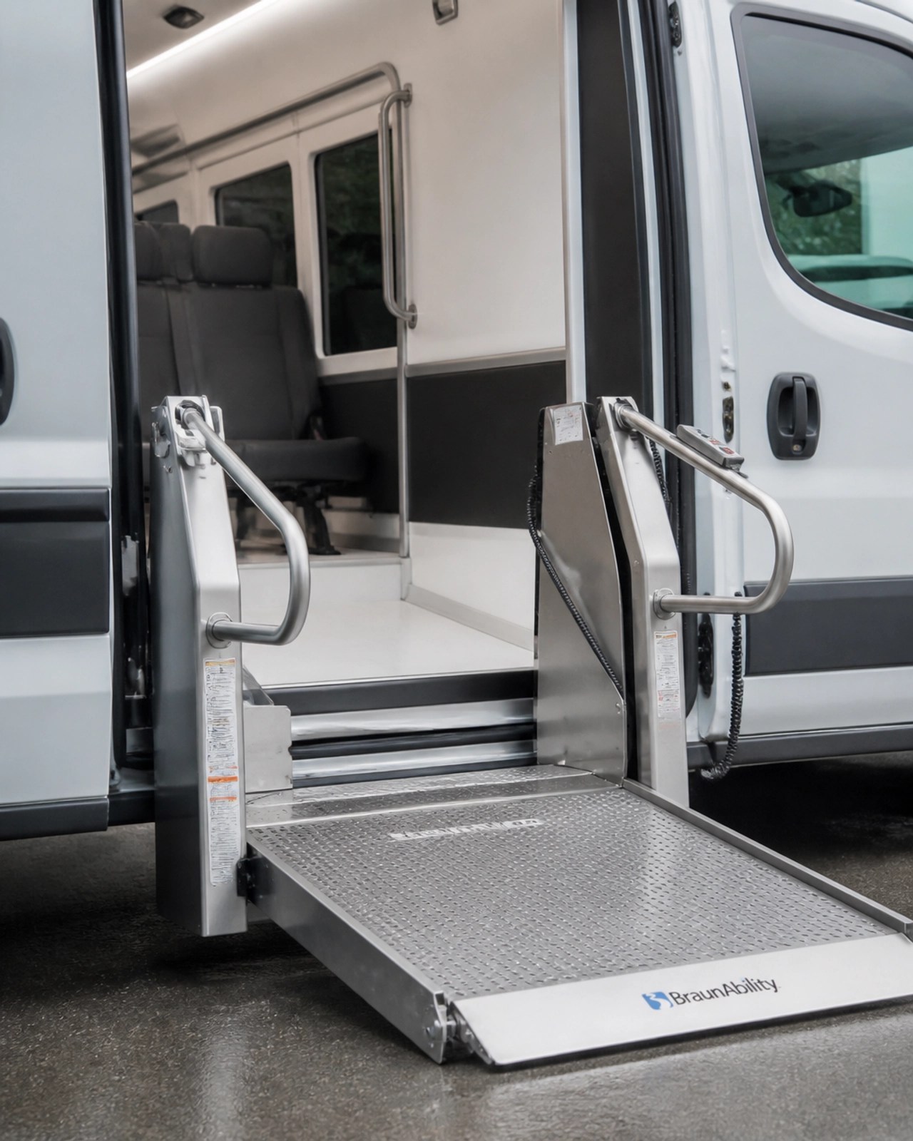 A close-up, minimalistic photo of a clean wheelchair lift on a modern transport vehicle, highlighting accessibility and safety.