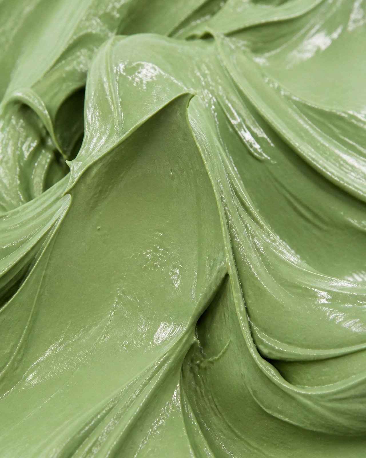 Close up of the rich texture of green clay