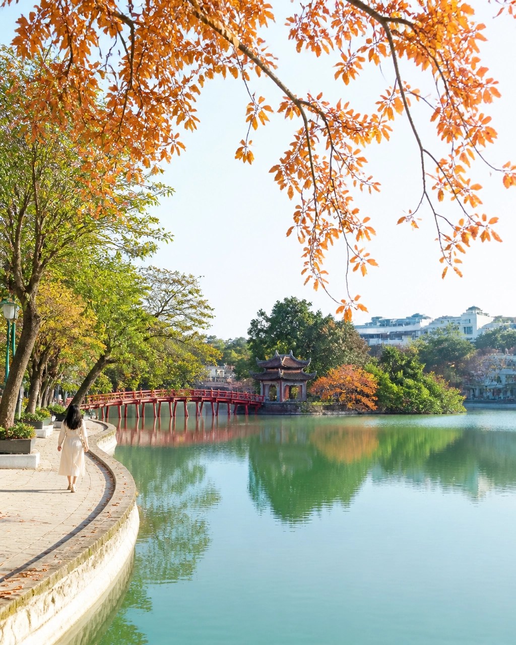 Tranquil Hoan Kiem Lake and Ngoc Son Temple in bright autumn daylight