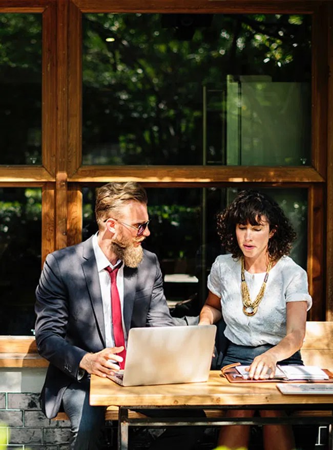 Modern Day Property Management professional team meeting with a client