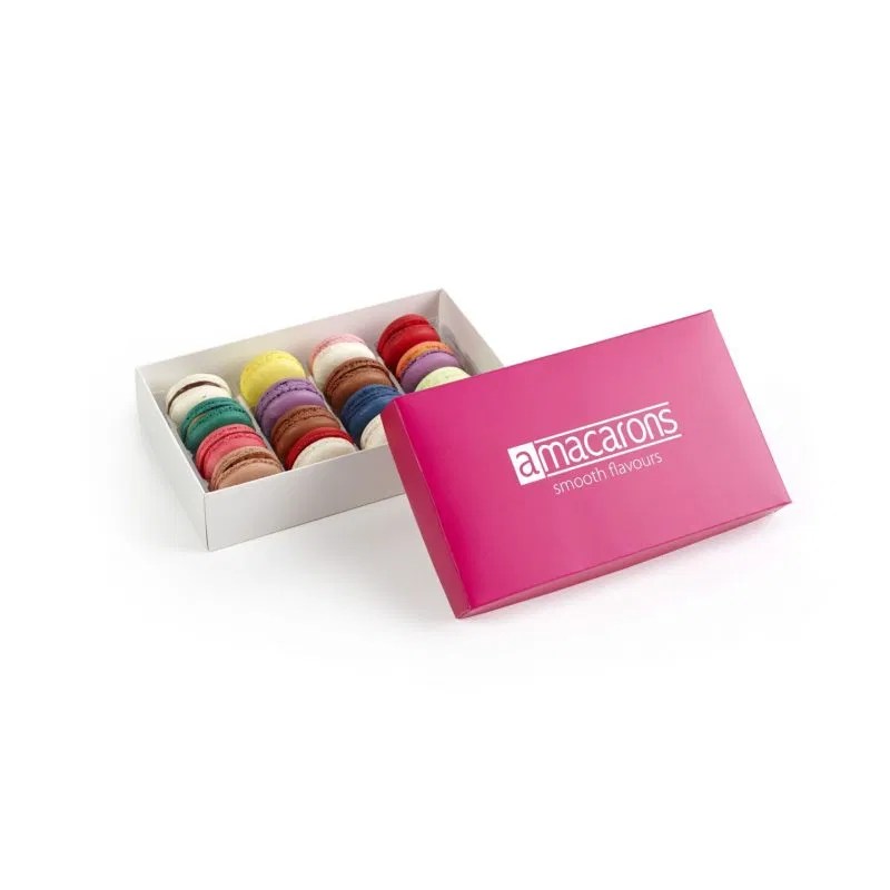 Een premium fuchsia geschenkdoos met een assortiment klassieke en seizoensgebonden smaken, perfect voor luxe detailhandel en zakelijke presentaties.