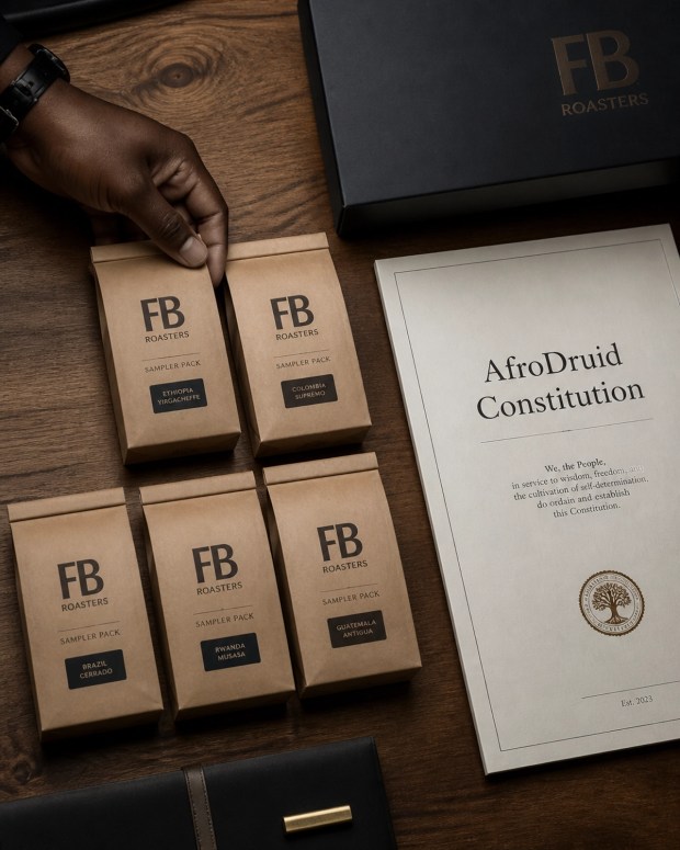 A stylized Sampler Pack of coffee beans and the AfroDruid Constitution document on a wooden table.