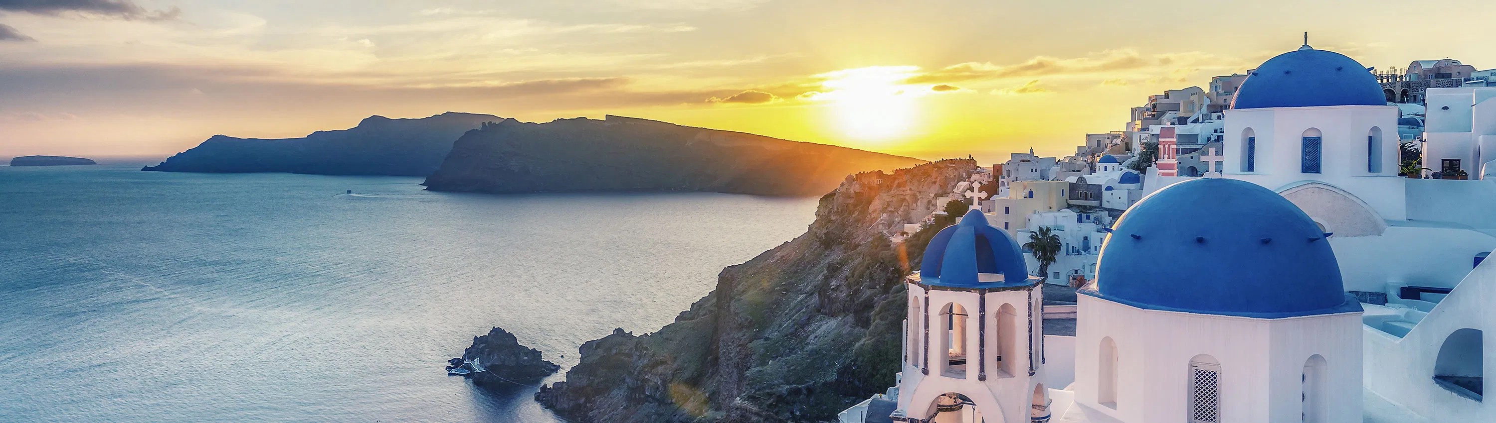 Panoramic view of Santorini at sunset