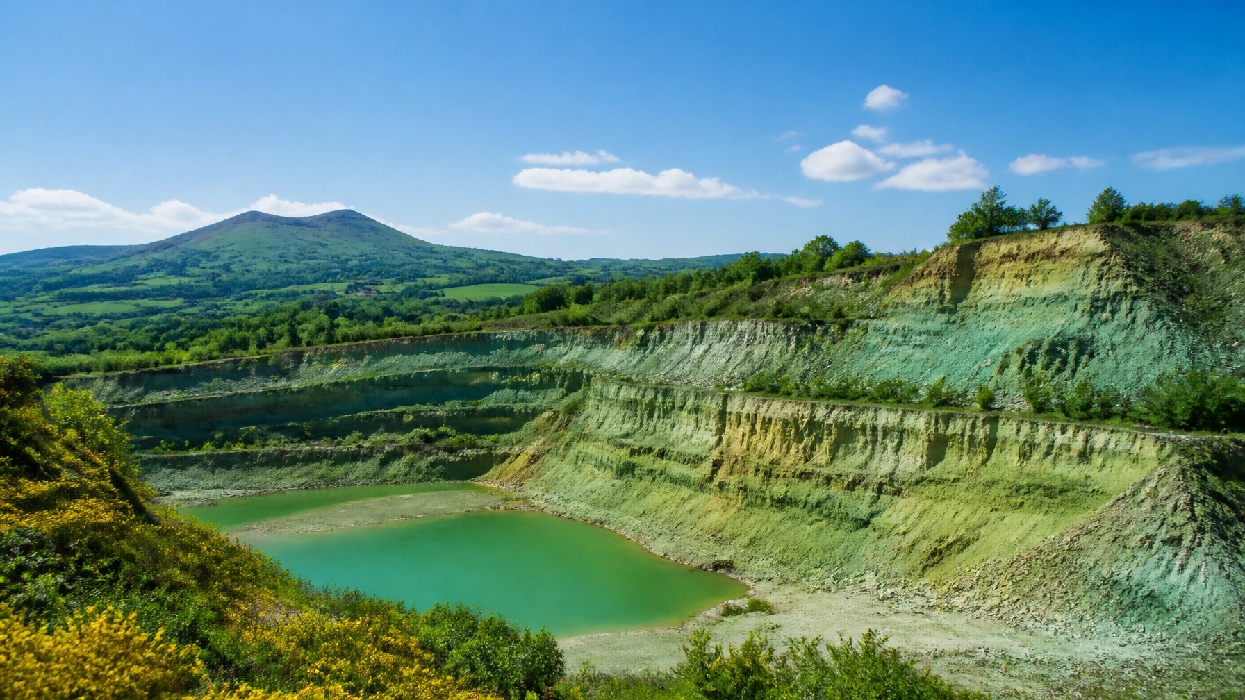 A pristine green clay quarry in France