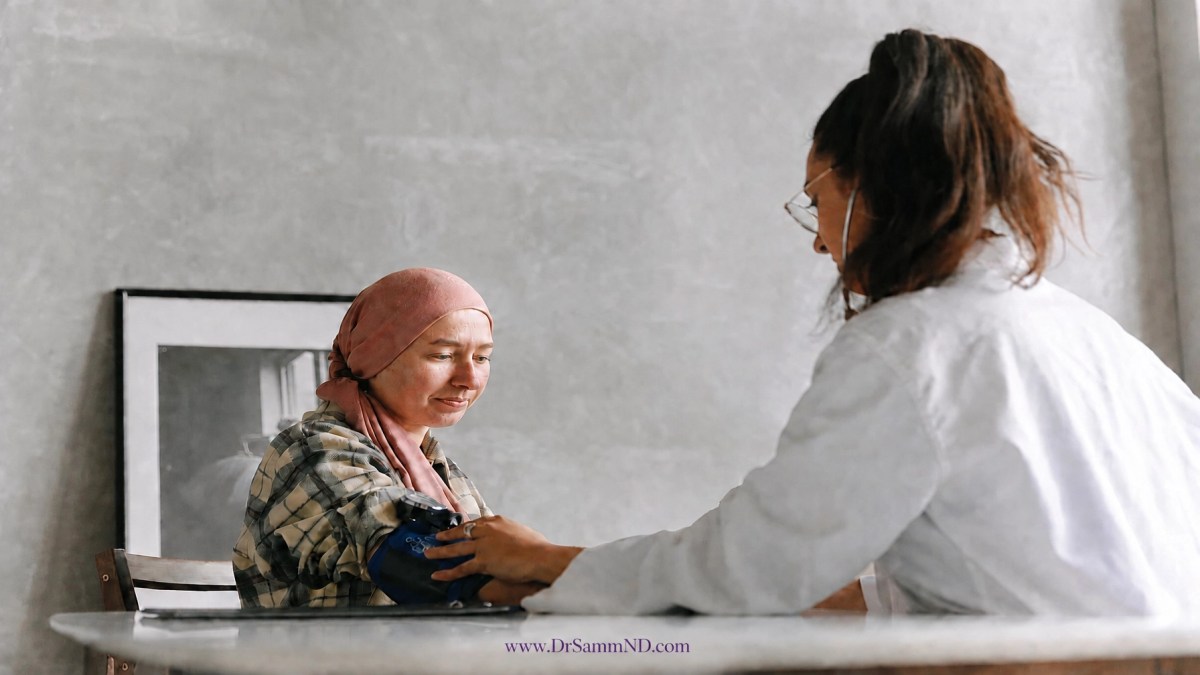 A naturopathic physician and patient reviewing a personalized cancer care plan together