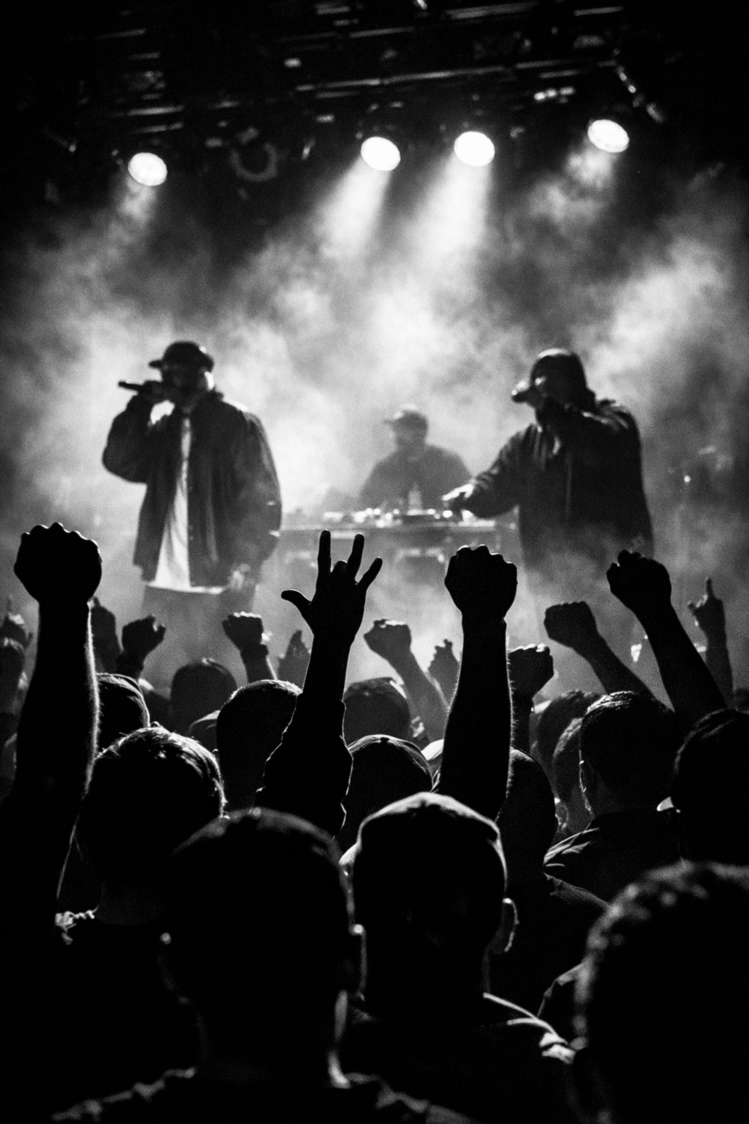 West Coast hip hop concert crowd with raised hands celebrating 90s hip hop culture and unity