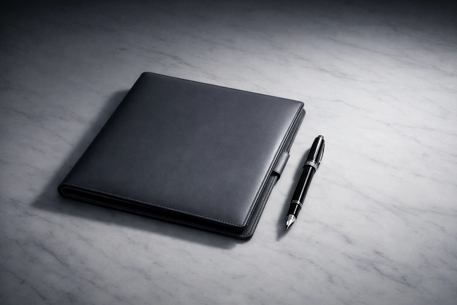Professional document portfolio for an Airbnb permit Sonoma County application on a marble table.