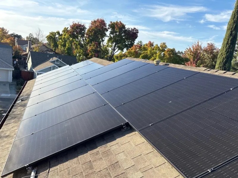 Black solar panels installed across the roof of a California home
