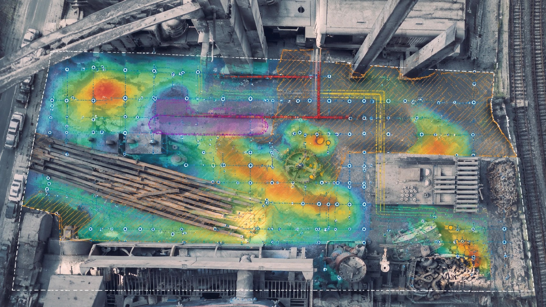 Subsurface interpretation showing a shifted Phase II boring grid around utility corridors, a former UST, buried debris, and a historic fill boundary