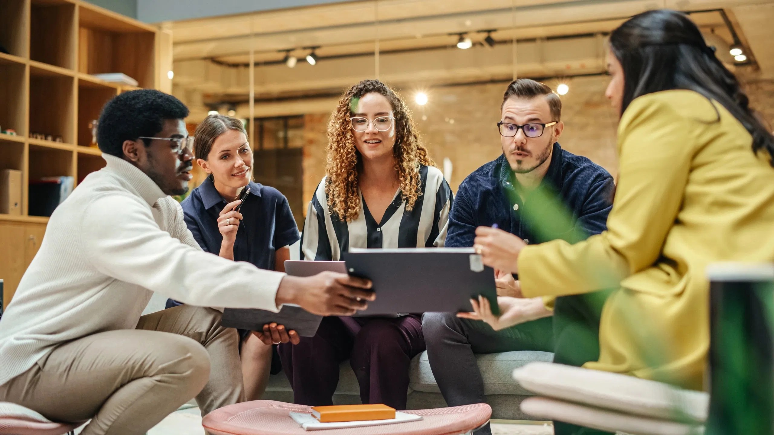Team collaborating on technical SEO strategy in a modern office