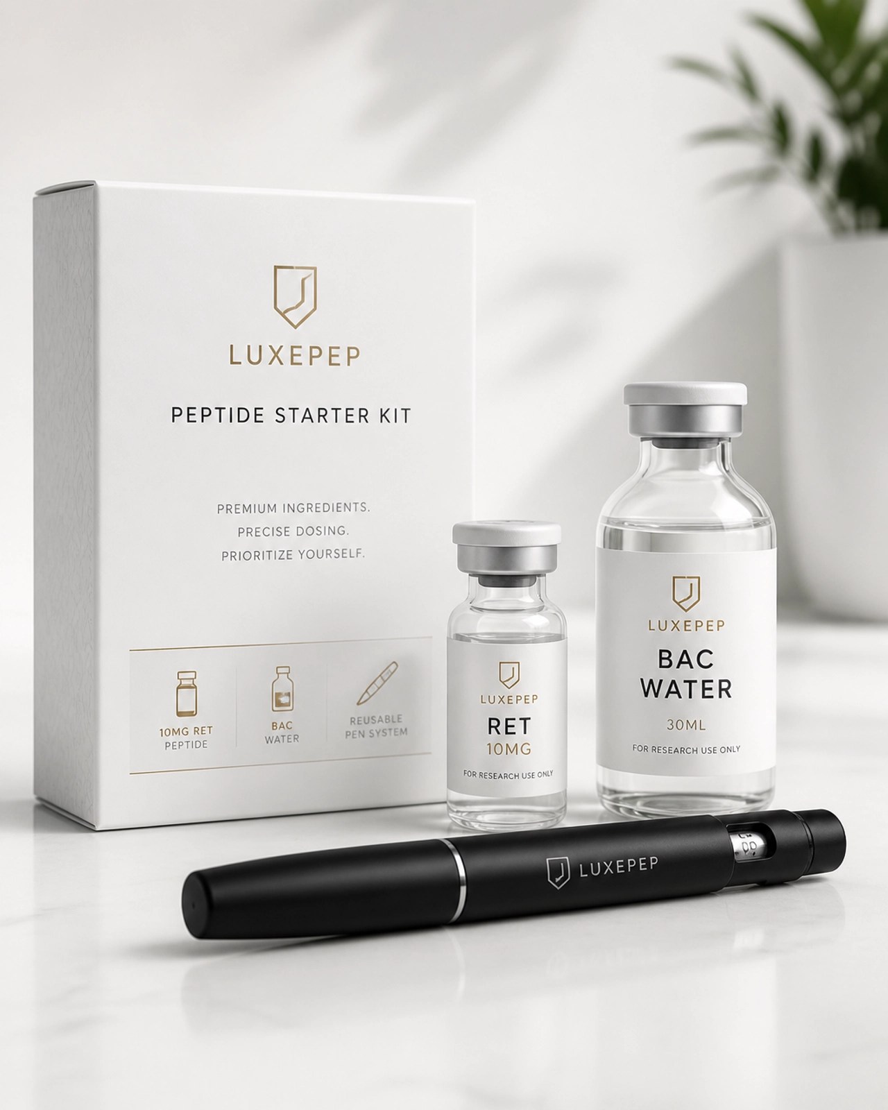 A luxury peptide starter kit including a 10mg Ret vial and a bottle of Bac water on a clean clinical surface.