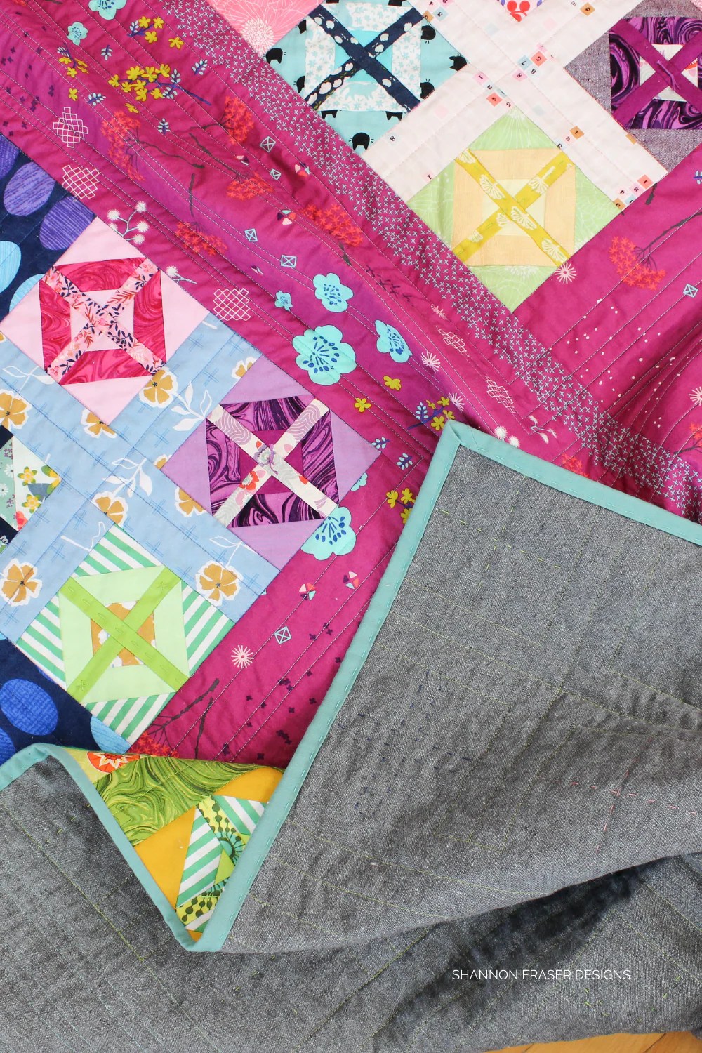 Plus Infinity Quilt - the scrappy version featuring Essex Linen backing | Beginner Modern Plus Quilt Pattern | Shannon Fraser Designs #scrapbusterquiltpattern