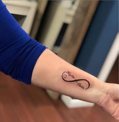 Three different small flowers can stand for your three different . Best Mom Tattoos Top 10 Tattoo Ideas For Mom Mrinkwells