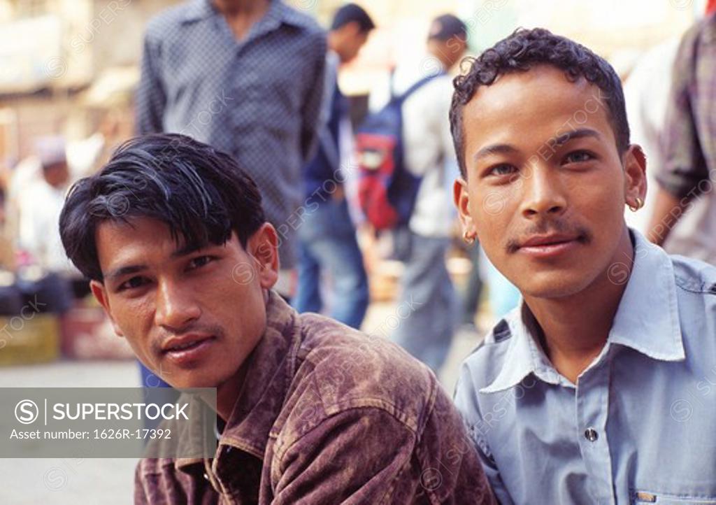Nepali is the official language of the country, but there are many other regional languages in nepal. Young Nepalese Men on Street, Kathmandu Stock Photo 1626R-17392
