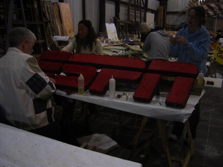 The flower crew preps the ESPN logo